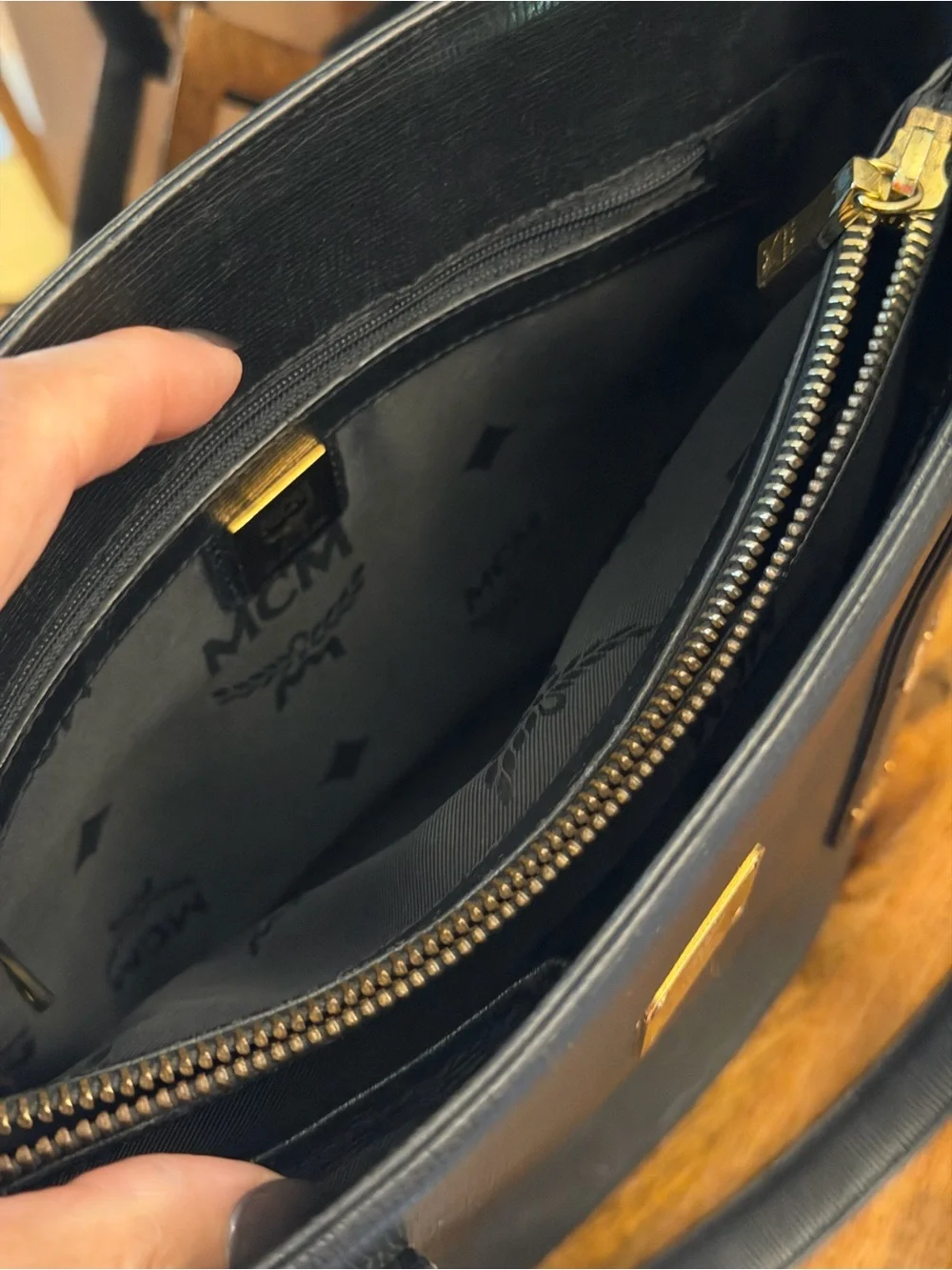 MCM Black Leather satchel zipper Tote with Gold charms + gold Logo Plaque C2072